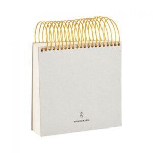 grauer Block mit goldener Spirale